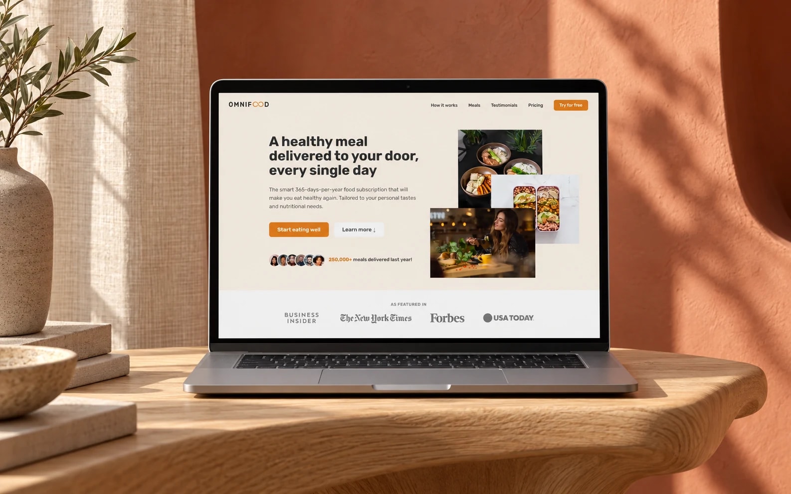 Omnifood’s existing meal subscription website on a laptop in a pale-oak and terracotta studio.
